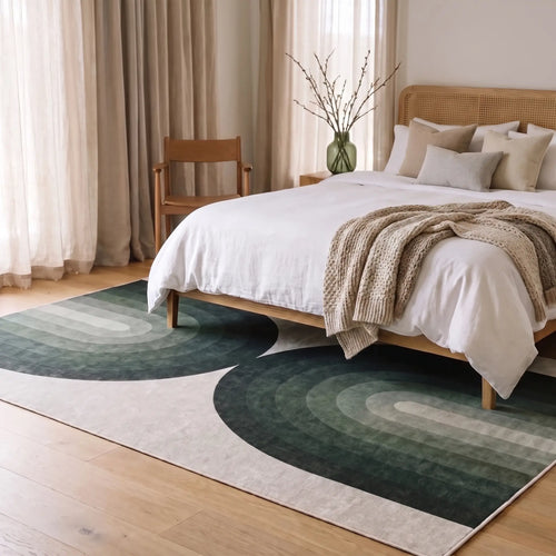 Absida Sage Arch Rug in a bedroom