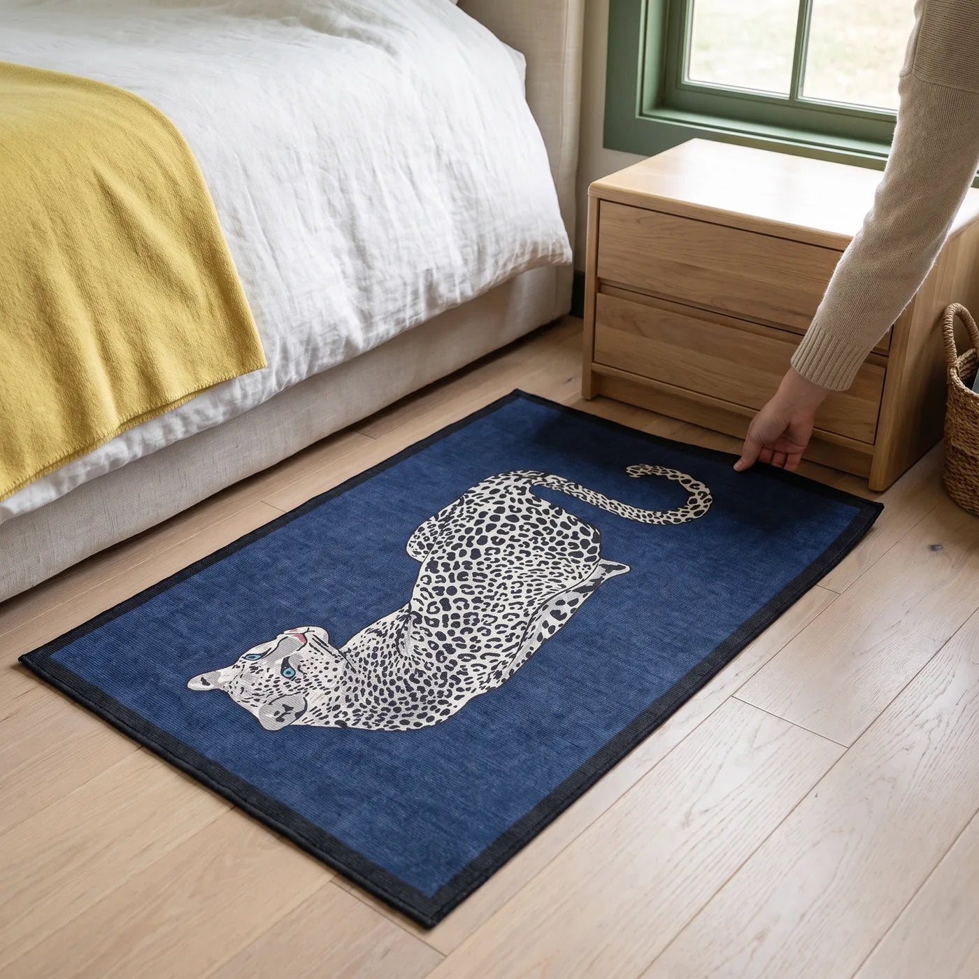 Snow Leopard Sapphire Blue Rug shown in a home