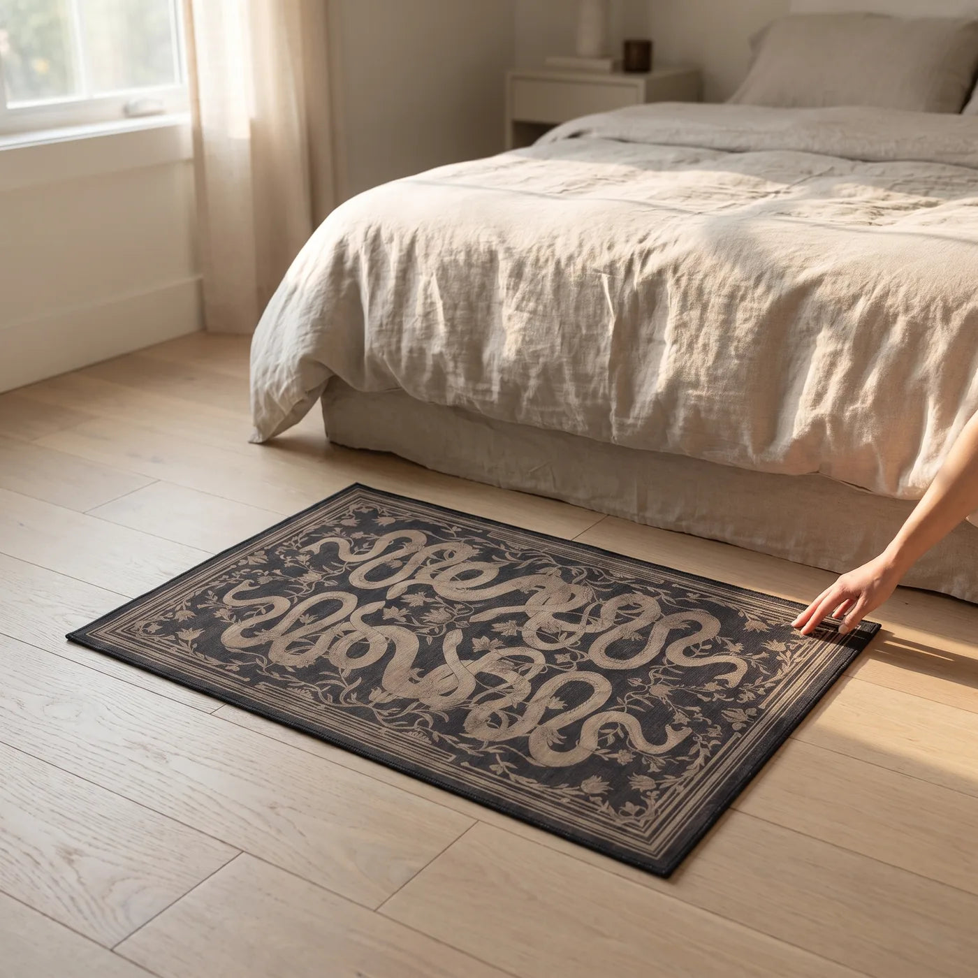 Sumaya Soft Black Serpent Rug shown in a home