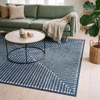 Inkdrop Lapis Blue Striped Rug in a living room