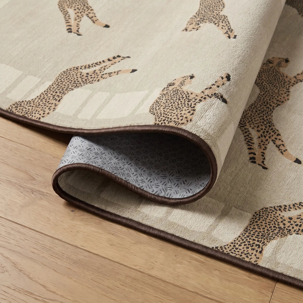 Leaping Cheetah Sand Rug folded corner detail