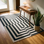 Op Art Charcoal Rug in an entryway