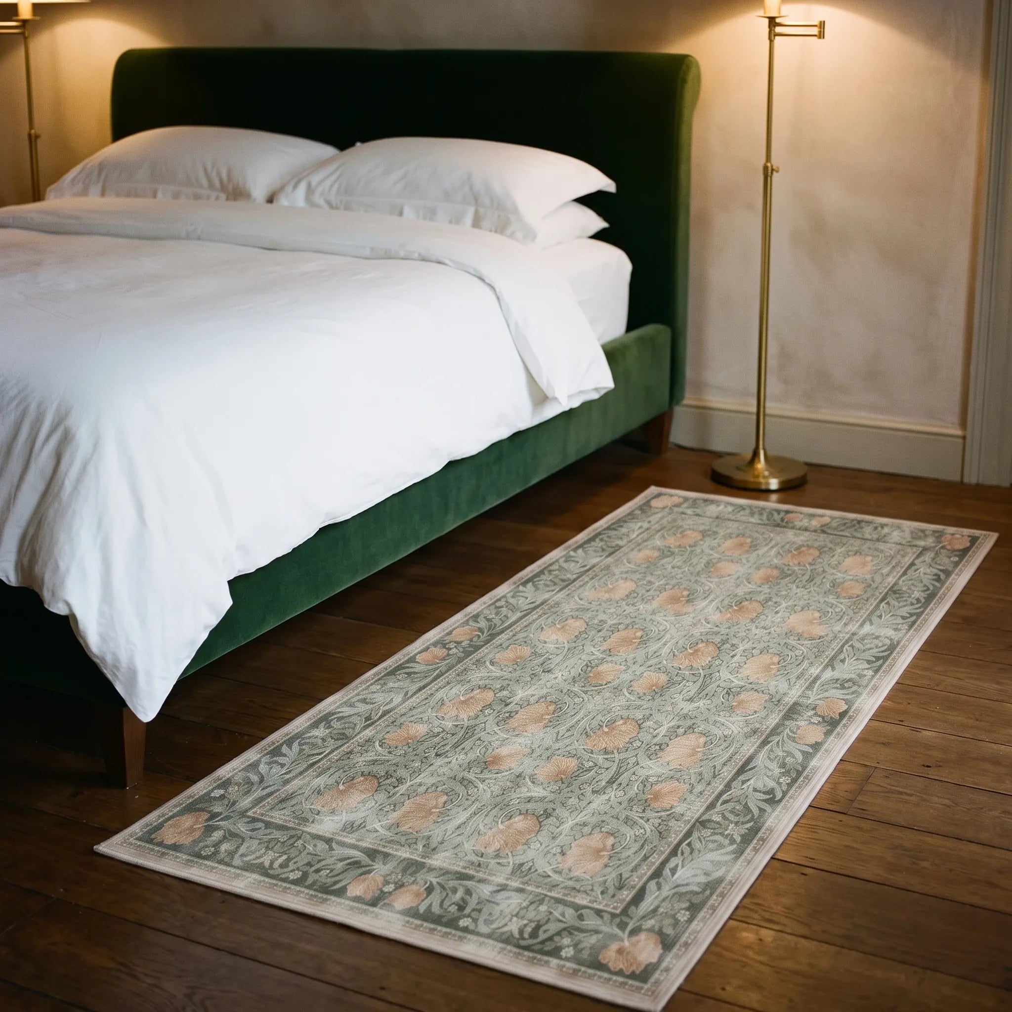 Pimpernel Jade Rug beside a bed