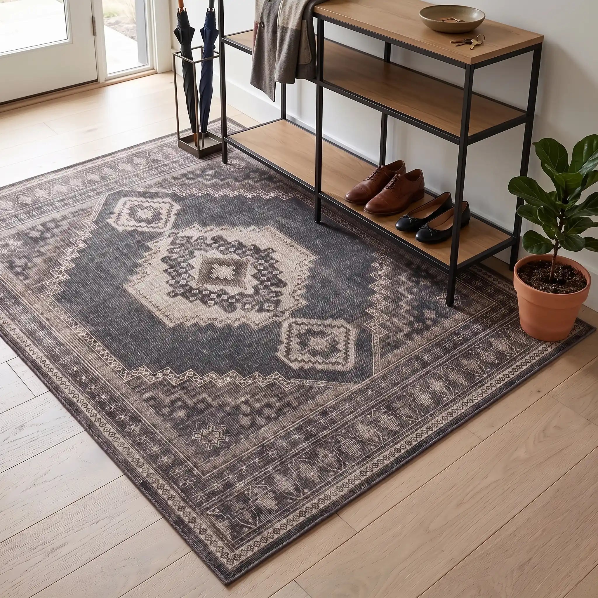 Rayne Charcoal and Tan Medallion Rug in an entryway