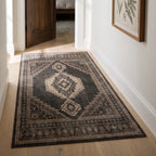 Rayne Charcoal and Tan Rug in a hallway
