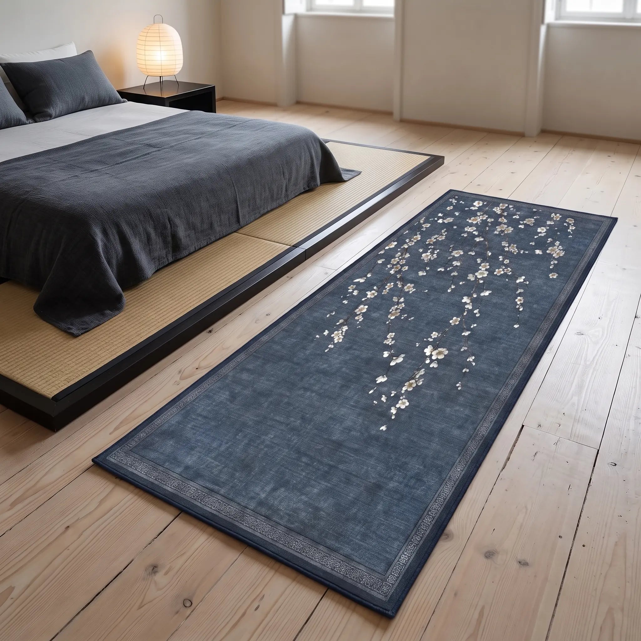Sakura Indigo Rug beside a bed
