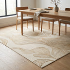 Sana Cream and Gold Rug in a dining room