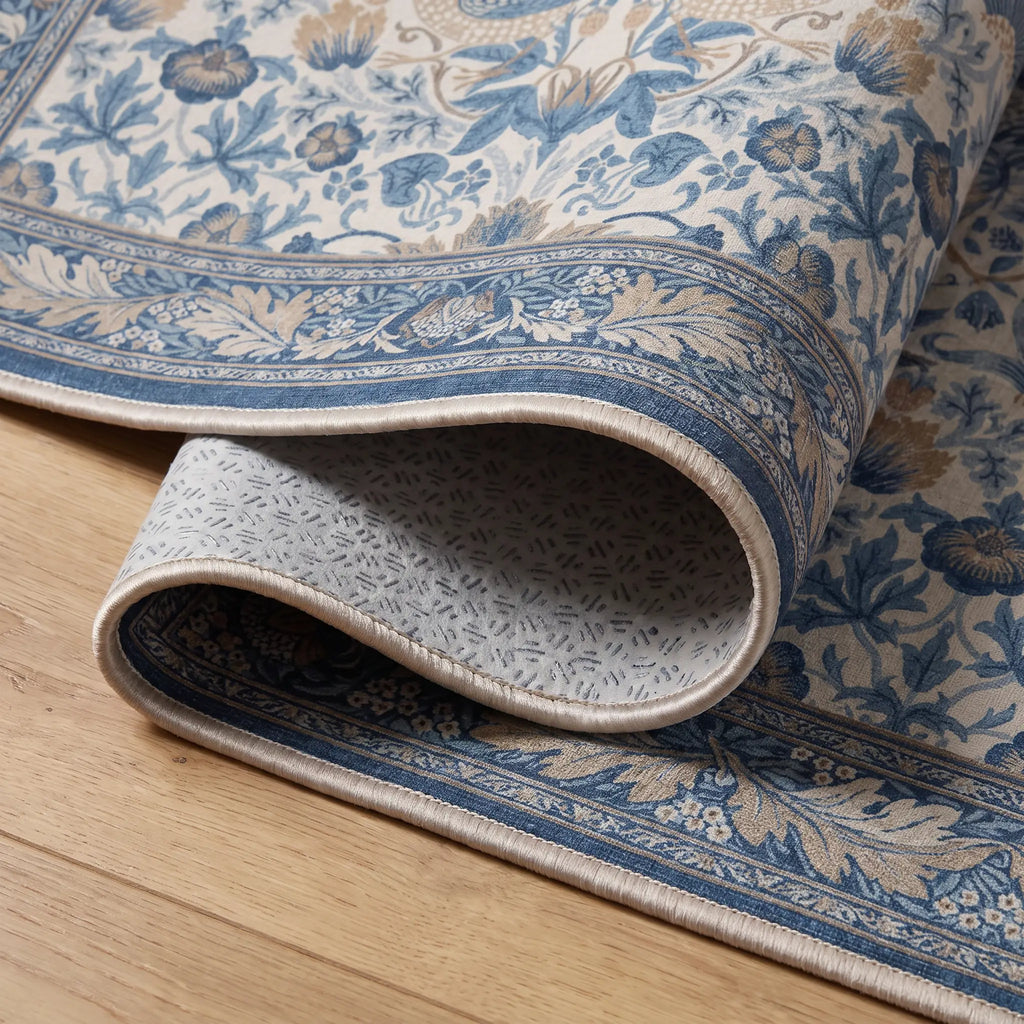Strawberry Thief Indigo and Ivory Rug folded corner detail