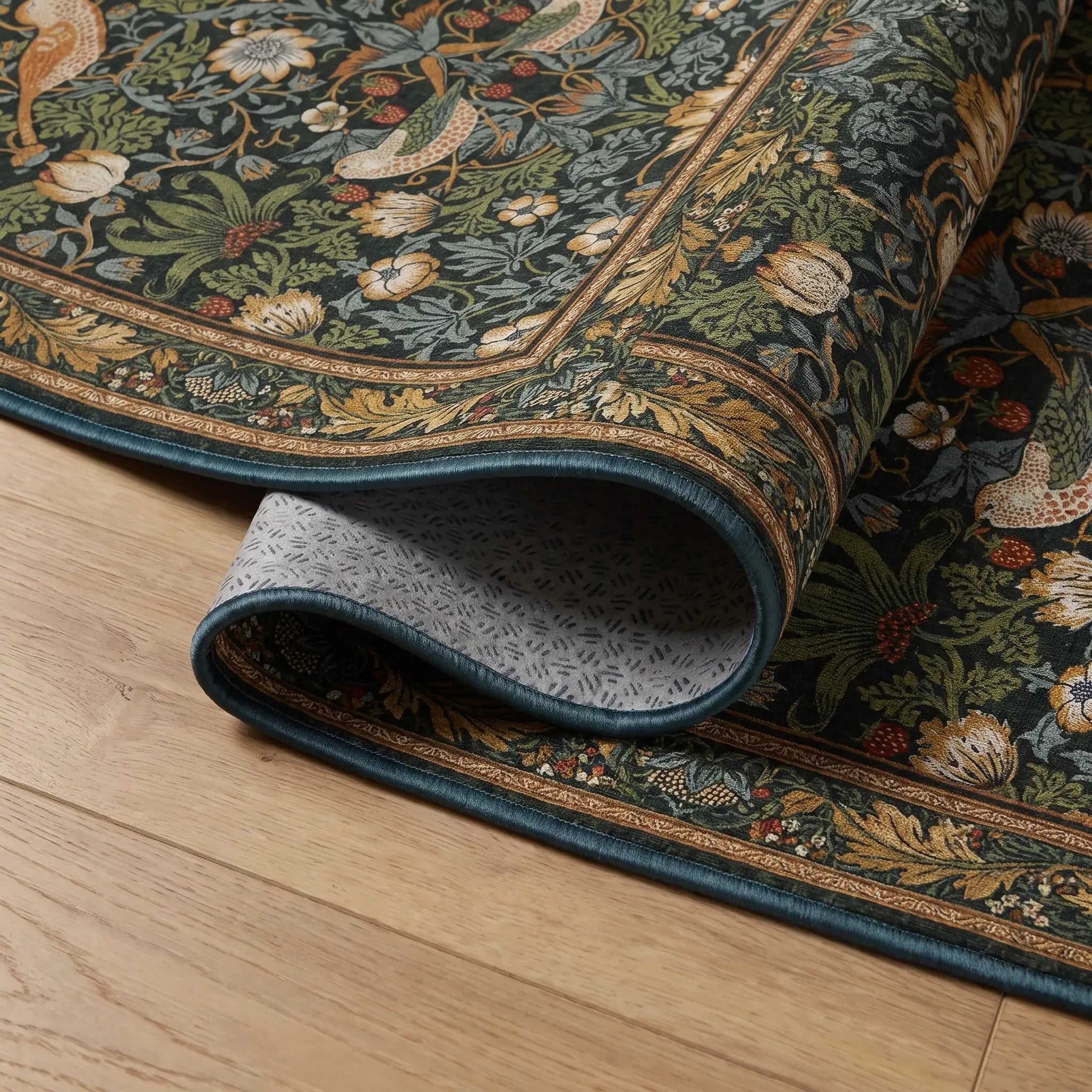 Strawberry Thief Indigo Rug folded corner detail